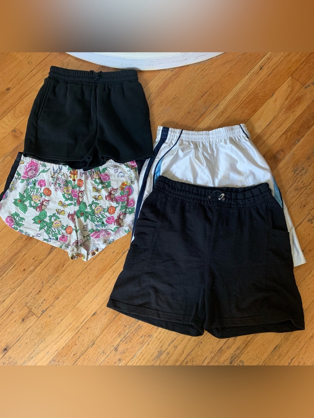 Bundle of 4 summer shorts ranging from size S-L